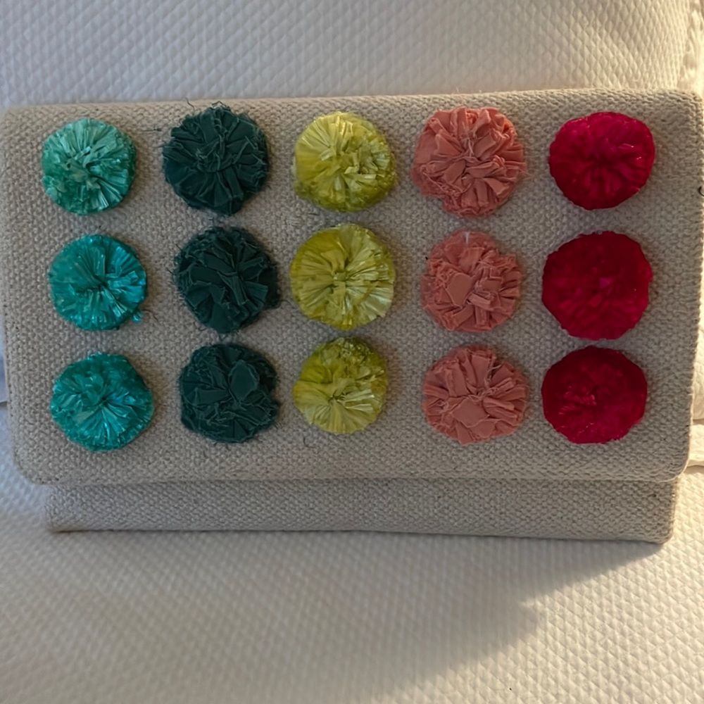 Stella and Dot linen clutch with straw flowers